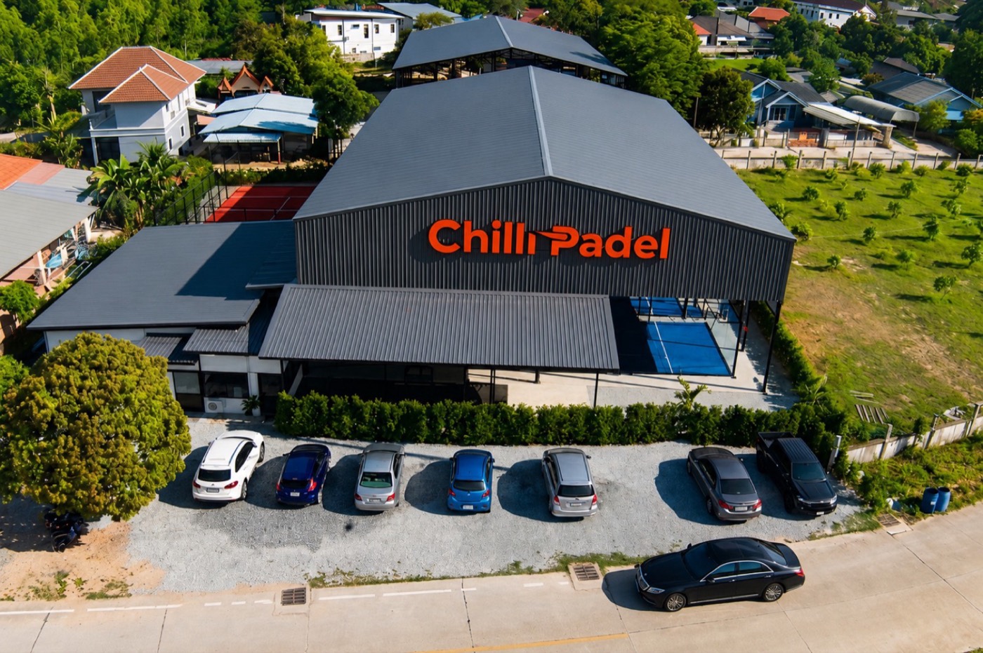 Aerial view of Chilli Padel Jomtien Pattaya — six courts, five roofed
